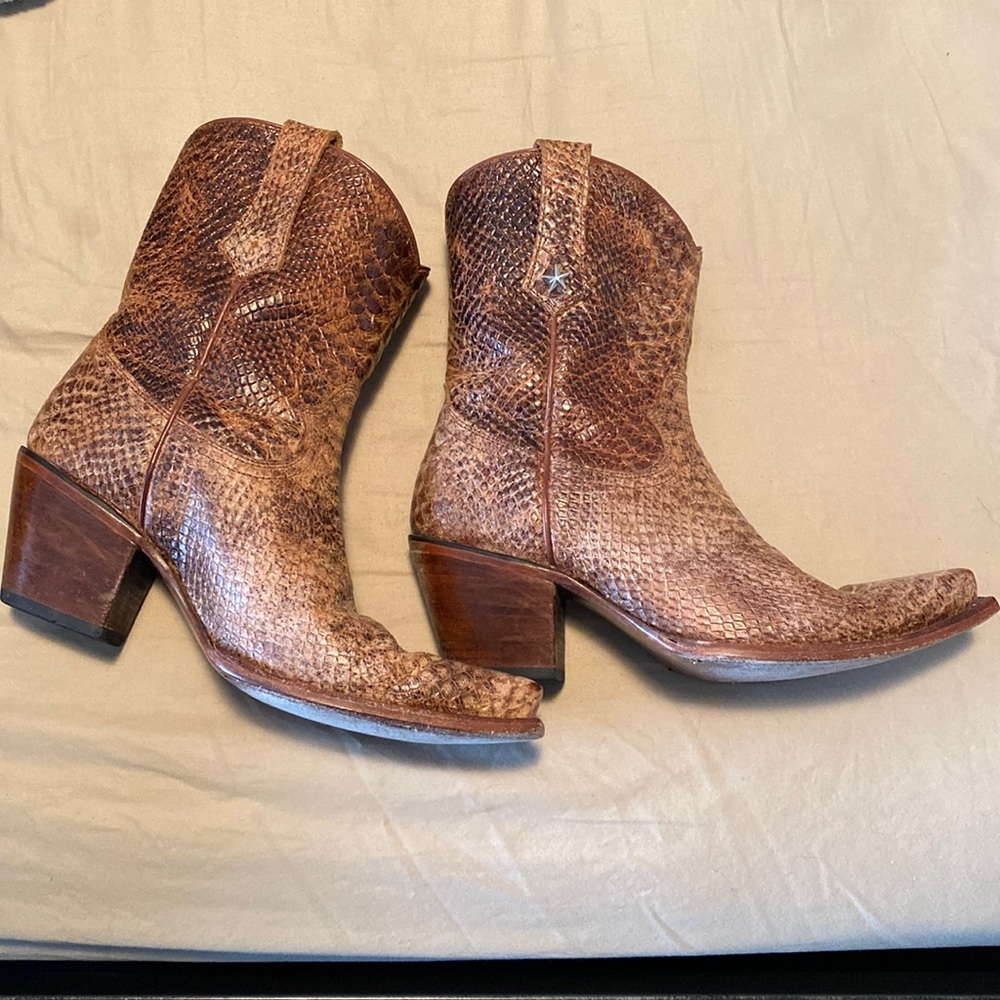 Faux snake skin booties by Miranda Lamber